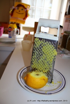Grate the rind off a well-washed lemon